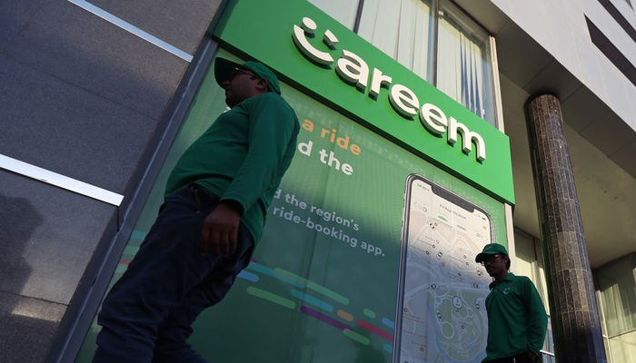 Careem employees walk past the company headquarters in Dubai, UAE December 13, 2018.— Reuters/File