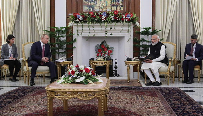 Russian President Vladimir Putin and Indias Prime Minister Narendra Modi hold a meeting at Hyderabad House in New Delhi on December 6, 2021. — AFP