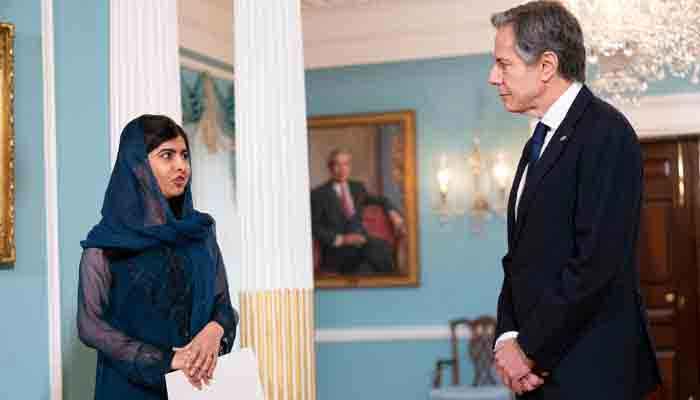 Malala Yousafzai, Pakistani activist for female education and a Nobel Peace Prize laureate accompanied by Secretary of State Antony Blinken, speaks in the Treaty Room at the State Department in Washington on December 6, 2021. Photo: by AFP