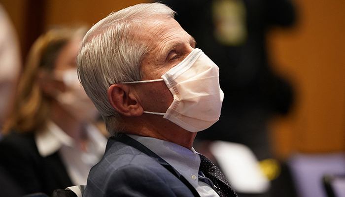 In this file photo taken on December 02, 2021, National Institute of Allergy and Infectious Diseases Director Anthony Fauci listens to US President Joe Biden speak about the administration response to Covid-19 and the Omicron variant at the National Institutes of Health (NIH) in Bethesda, Maryland. Fauci said on December 7, 2021. — AFP