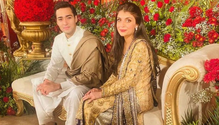 PML-N Vice Presidents son Junaid Safdar with wife Ayesha Saif in Lahore pose for a picture during one of their wedding events. —  Instagram/@maliharehman1