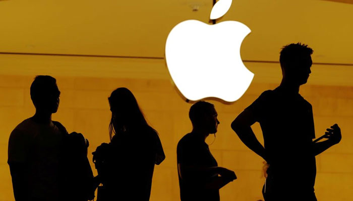 Customers walk past an Apple logo inside of an Apple store at Grand Central Station in New York, U.S., August 1, 2018.— Reuters/File