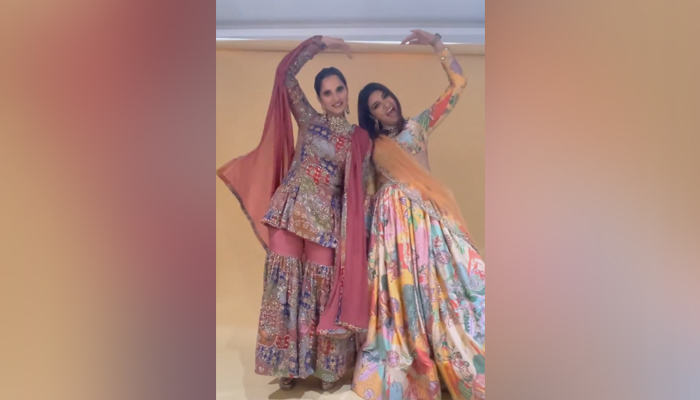 Indian tennis star Sania Mirza (left) dances with her sister, Anam Mirza. — Instagram