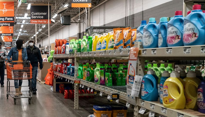 Shoppers browse in a Home Depot building supplies store while wearing masks to help slow the spread of coronavirus disease (COVID-19) in north St. Louis, Missouri, US April 4, 2020. Picture taken April 4, 2020.— Reuters/File