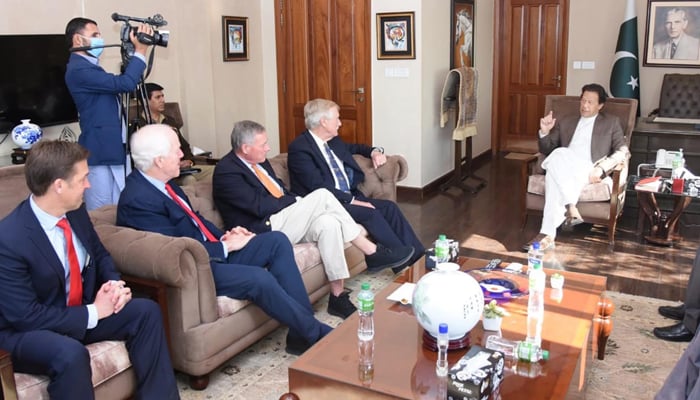 Prime Minister Imran Khan meets afour-member delegation of the US Senate in Islamabad on December 11, 2021. — PID