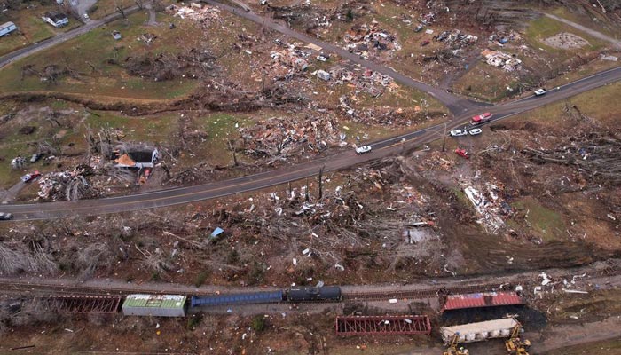A derailed train is seen amid damage and debris after a devastating outbreak of tornadoes ripped through several US states in Earlington, Kentucky, US December 11, 2021. — Reuters