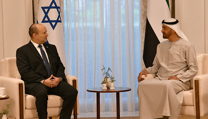 Israeli Prime Minister Naftali Bennett meets with Abu Dhabi Crown Prince Sheikh Mohammed bin Zayed at his private palace in Abu Dhabi, United Arab Emirates, December 13, 2021. —