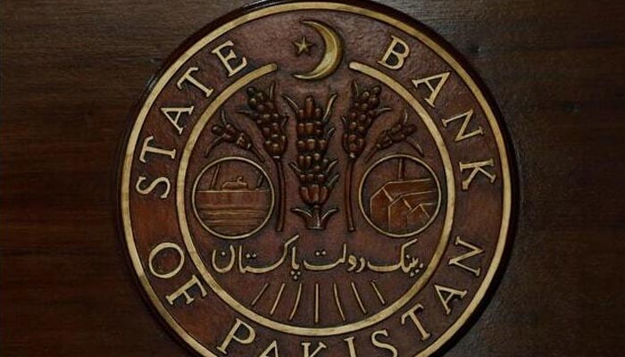 A logo of the State Bank of Pakistan is pictured on a reception desk at the head office in Karachi, July 16, 2019. — Reuters/File