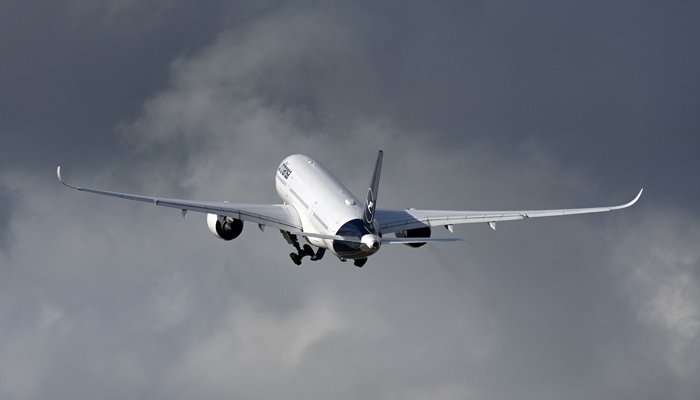 An Airbus A350 airplane of the German airline Lufthansa takes off for Miami at Franz-Josef-Strauss airport in Munich, southern Germany, on November 8, 2021. — AFP