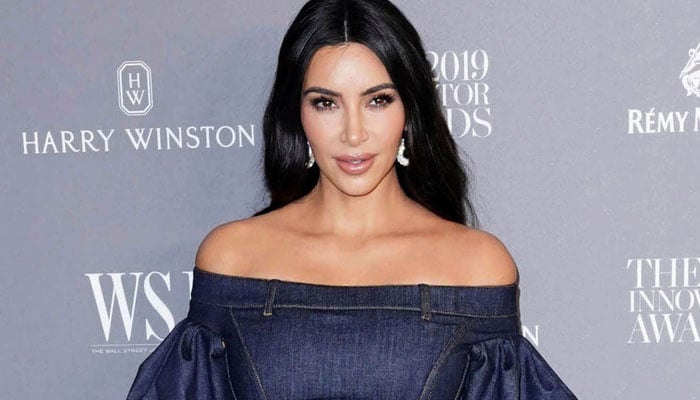 Kim Kardashian calls Grammy pianist to play Christmas music each day to wake kids