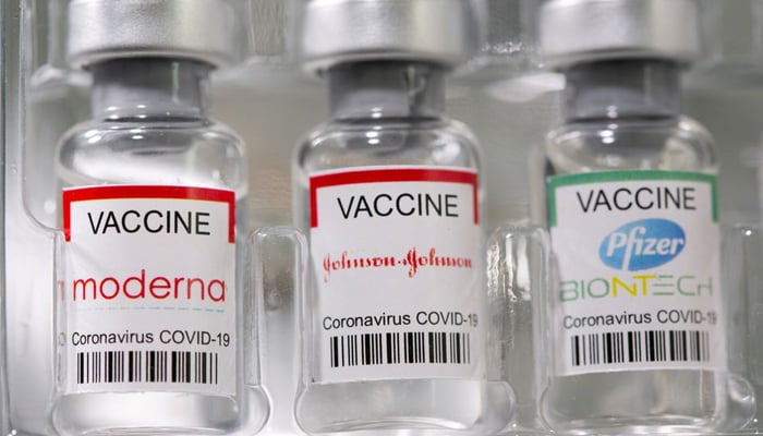 Vials labelled Moderna, Johnson & Johnson, Pfizer-BioNTech coronavirus disease (COVID-19) vaccine are seen in this illustration picture taken May 2, 2021. — Reuters/File