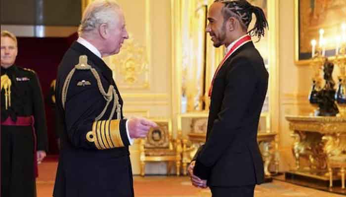 Prince Charles honours Lewis Hamilton at Windsor Castle