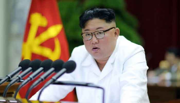Kim Jong Un speaks at a ceremony. Photo: AFP