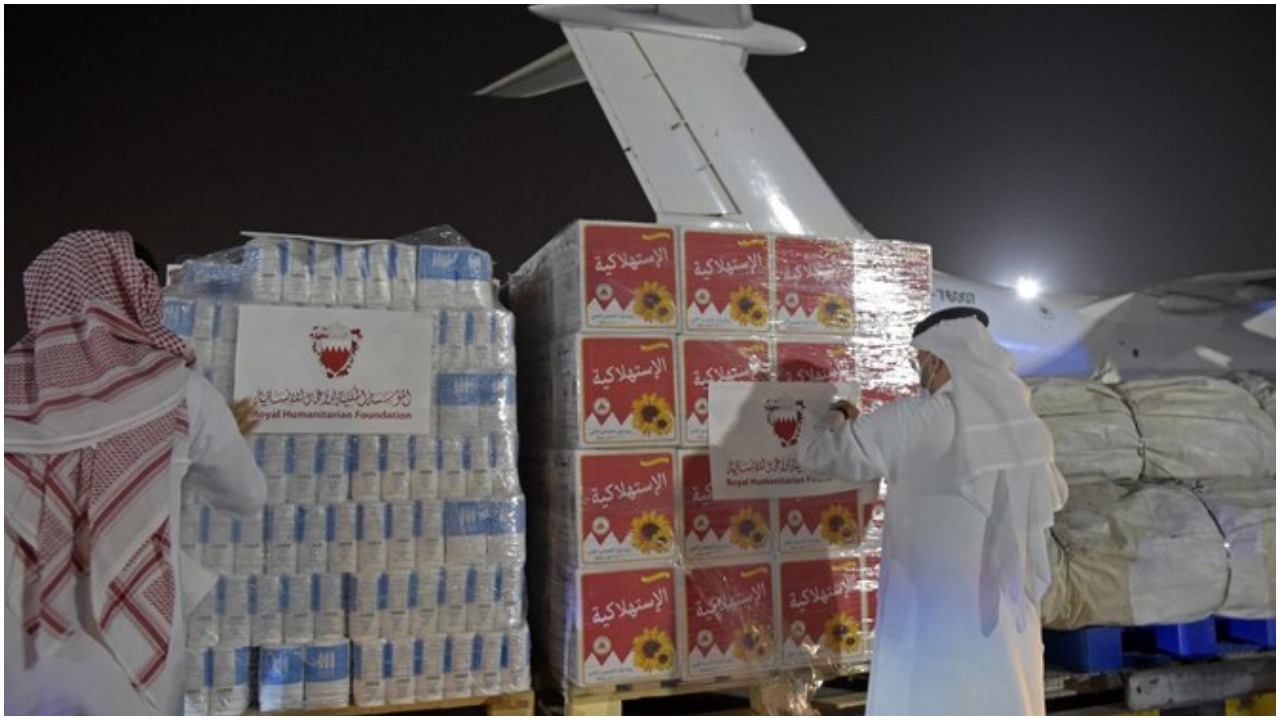 Volunteers label a shipment of humanitarian aid to be sent to Afghanistan at Bahrain International Airport on Muharraq Island, near the capital Manama, on September 4, 2021. Photo: AFP
