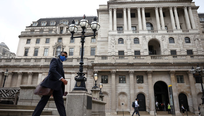 A person walks past the Bank of England in the City of London financial district, in London, Britain, June 11, 2021. — Reuters/File