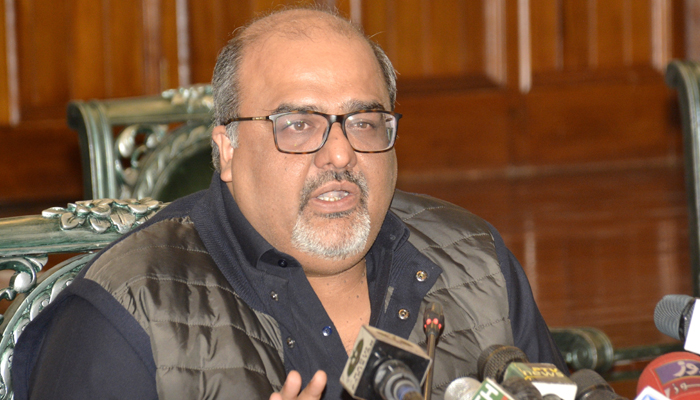 Advisor to the Prime Minister on Accountability and Interior Barrister Shahzad Akbar addressing a press conference in Lahore, on December 17, 2021. — PID