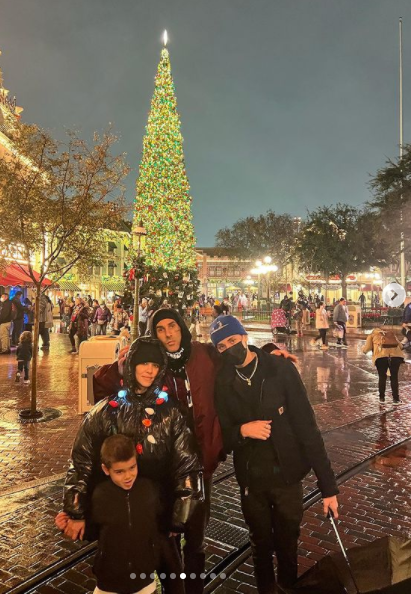 Kourtney Kardashian, Travis Barker enjoy festive mood at Disneyland with the kids