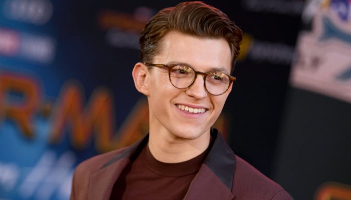 Holland had reportedly planned to surprise fans at early screenings of the film on Friday in Los Angeles