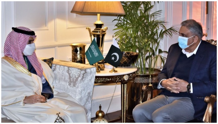 Saudi Arabias Foreign Minister, Prince Faisal Bin Farhan Al Saud speaking with Chief of Army Staff (COAS) General Qamar Javed Bajwa on the sidelines of the OIC moot at the GHQ on Sunday, December 19, 2021. — ISPR