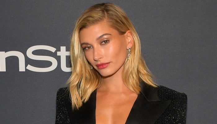Hailey Baldwin appears to get a ‘New York’ tattoo behind her ear