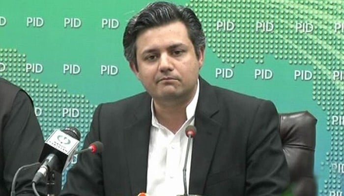 Federal Minister for Energy Hammad Azhar addressing a press conference — PID