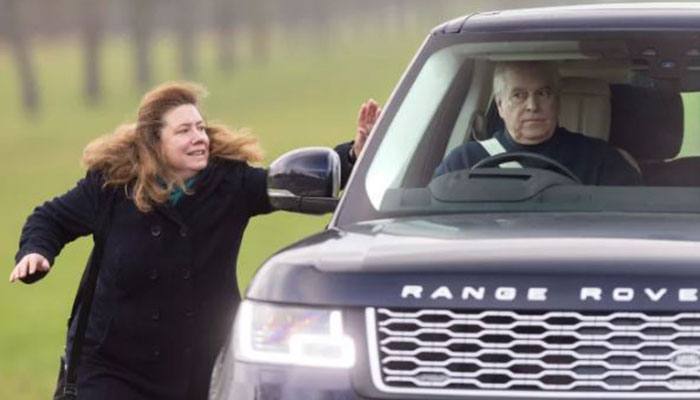 Woman bangs on Prince Andrews car window in royal security breach