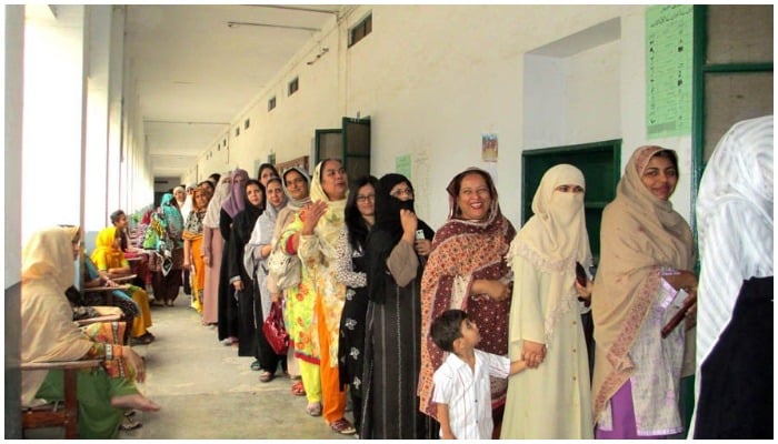 Women wait in a queue for their turn to cast a vote at a polling station in Pakistan. Photo: Geo.tv/ file