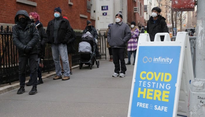 People queue for a COVID-19 test as the Omicron coronavirus variant continues to spread in Manhattan, New York. Reuters