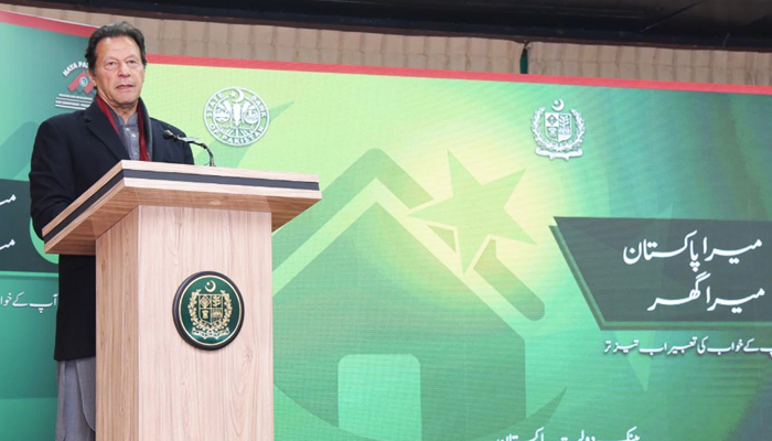 Prime Minister Imran Khan addressing a ceremony to mark Rs100 billion approvals in the Mera Pakistan Mera Ghar initiative in Islamabad on December 24, 2021. — PID