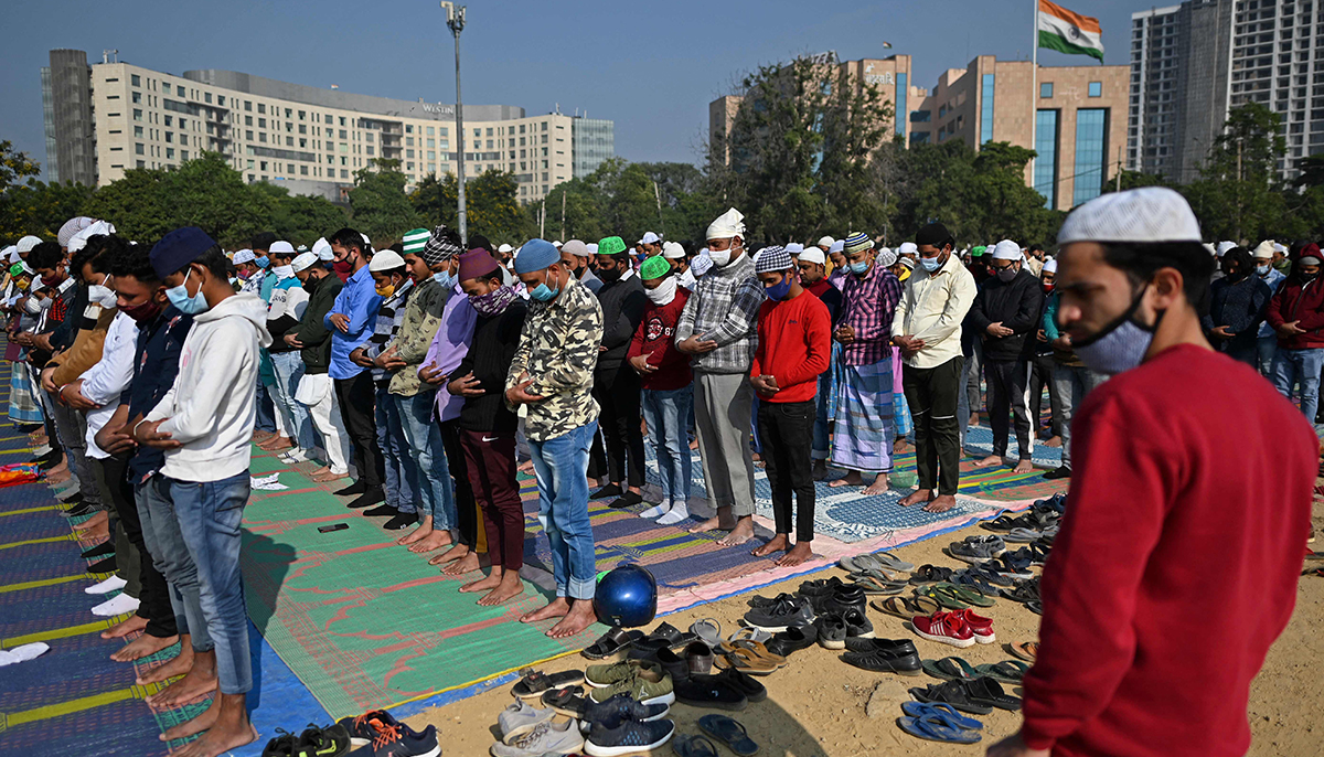 In this file photo taken on December 17, 2021, Muslim devotees offer Friday prayers in an open ground in Gurgaon, after several prayer sites were closed by the authorities following demands by right wing Hindu groups calling for banning Muslim prayers in open spaces. — AFP