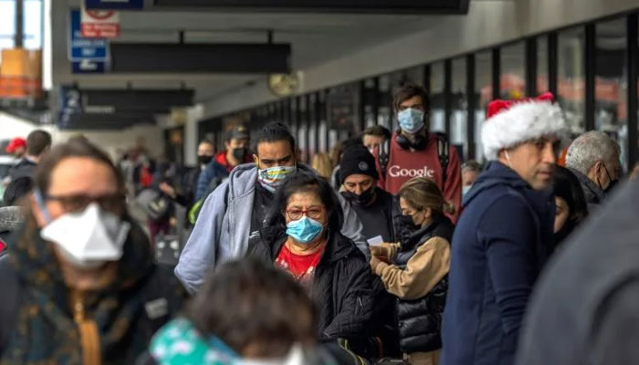 Travellers at Los Angeles International Airport on December 24, 2021. AFP