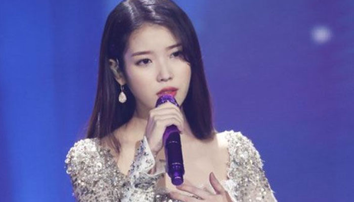 IU spreads joy among children, donates 200 million won amid holidays