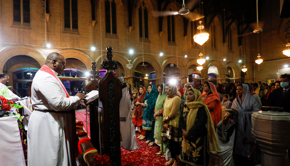 Pastor Wilson leads the Christmas Eve service at St. Andrews Church in Karachi, Pakistan, December 24, 2021. — Reuters.