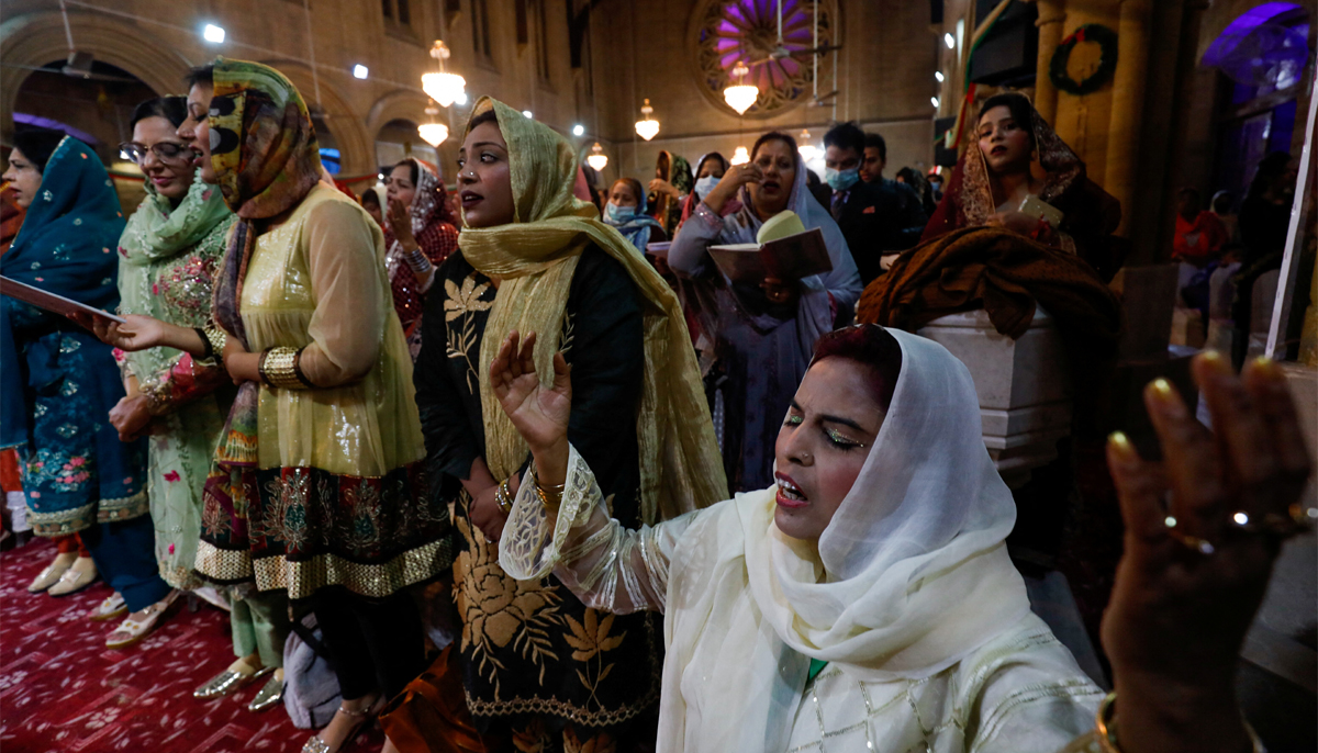 People pray during a Christmas Eve service at St. Andrews Church in Karachi, Pakistan, December 24, 2021. — Reuters.