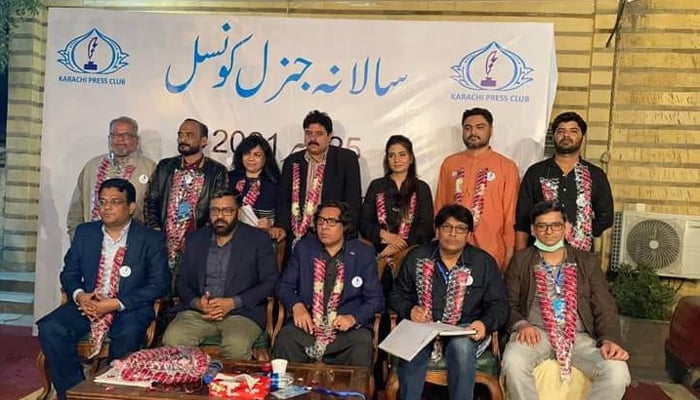 Fazil Jamili (front, centre) has been reelected Karachi Press Club president. — Photo courtesy Facebook/Rizwan Bhatti