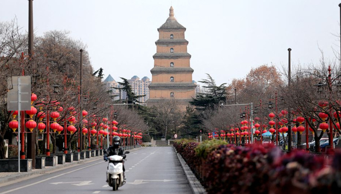 A rider travels on an empty road following lockdown measures to curb the spread of the coronavirus disease (COVID-19) in Xian, Shaanxi province, China December 26, 2021. — Reuters/File