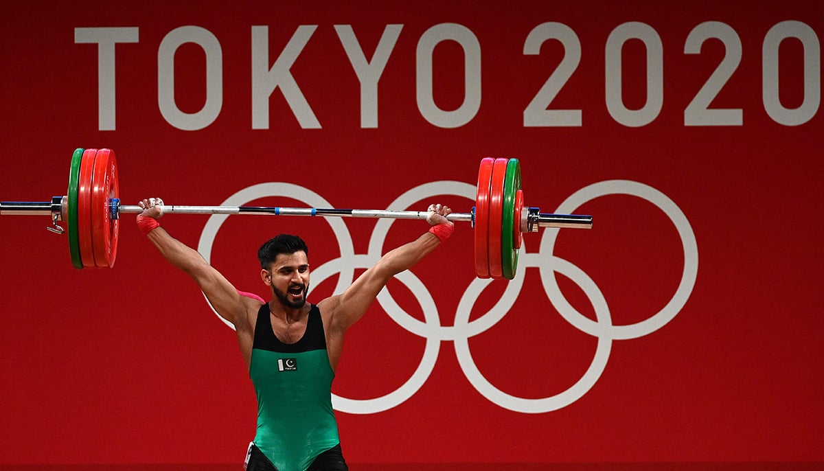 Pakistan´s Talha Talib competes in the mens 67kg weightlifting competition during the Tokyo 2020 Olympic Games at the Tokyo International Forum in Tokyo on July 25, 2021. — AFP