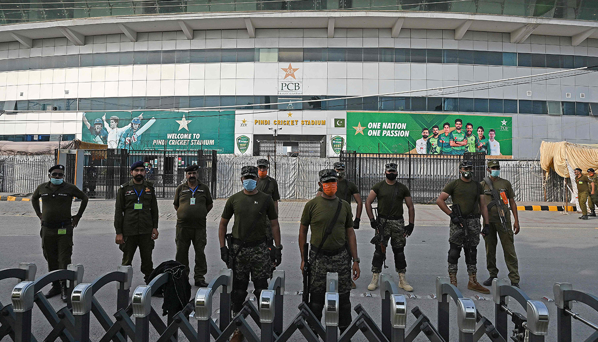 Policemen stand guard outside the Rawalpindi Cricket Stadium in Rawalpindi on September 17, 2021, after New Zealand postponed a series of one-day international (ODI) cricket matches against Pakistan over security concerns. — AFP