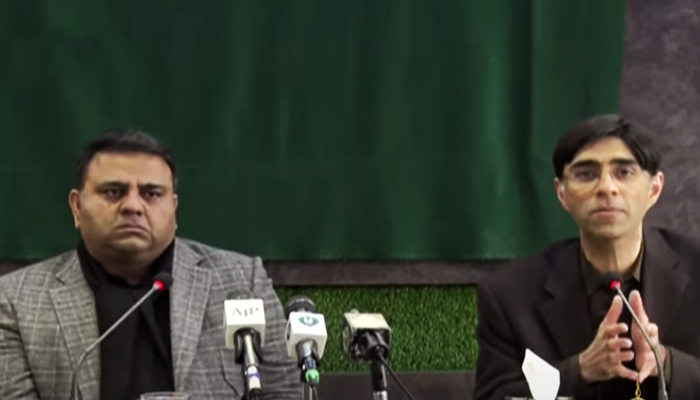 Information Minister Fawad Chaudhry, along with National Security Adviser Moeed Yusuf, addresses a press conference in Islamabad. Screengrab via Hum News