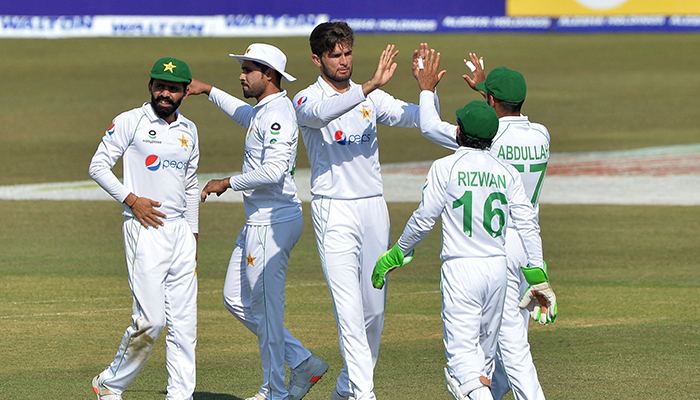 Pakistan´s Shaheen Shah Afridi (C) celebrates with teammates after taking the wicket of Bangladesh´s Liton Das (not pictured) on the fourth day of the first Test cricket match between Bangladesh and Pakistan at the Zahur Ahmed Chowdhury Stadium in Chittagong on November 29, 2021. — AFP