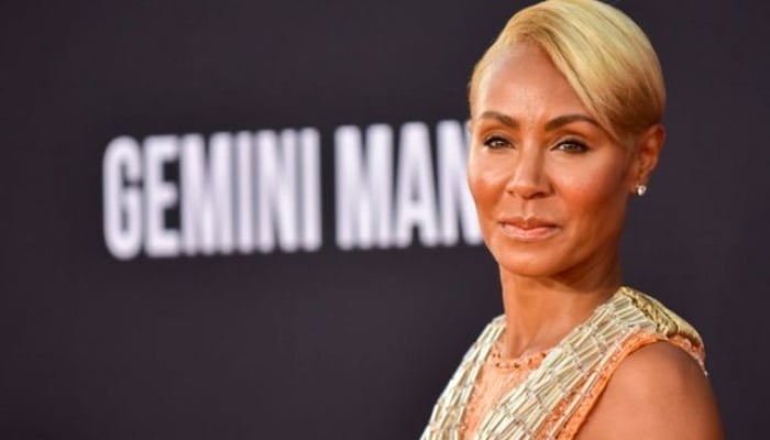 In a recent clip, Jada can be seen with her shaved head pointing to a thin bald line across her head
