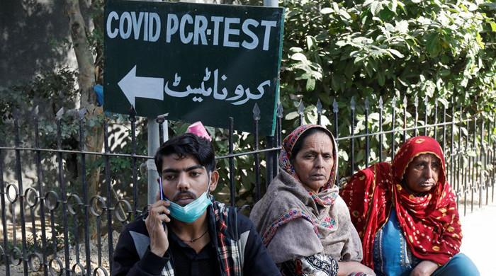 Pakistan achieves vaccination target for 2021 as Omicron spreads