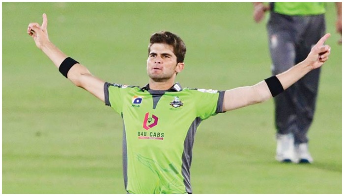 Lahore Qalandars’ Shaheen Shah Afridi celebrates after taking the wicket of Karachi Kings’ Waqas Maqsood during their Pakistan Super League match on Sunday. — AFP