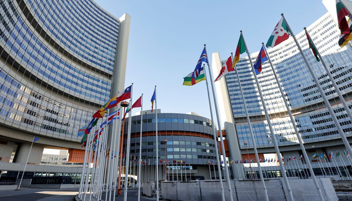 Flags are seen in front of the International Atomic Energy Agency (IAEA) headquarters, amid the coronavirus disease (COVID-19) pandemic, in Vienna, Austria May 23, 2021. — Reuters/File