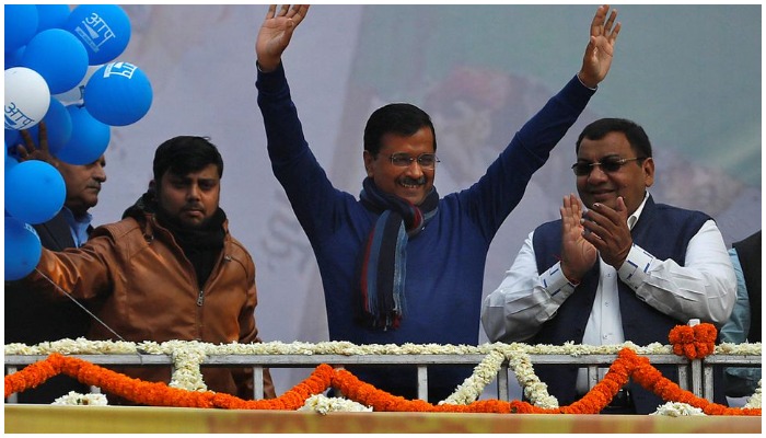 Delhi Chief Minister and leader of Aam Aadmi Party Arvind Kejriwal waves to his supporters during celebrations at the party headquarters in New Delhi, India, February 11, 2020. REUTERS