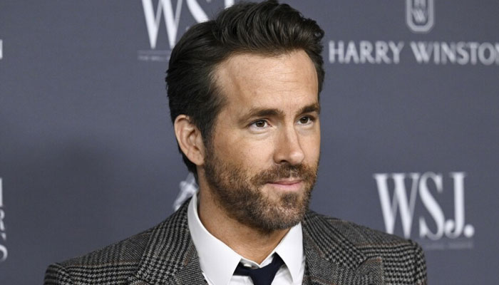 Ryan Reynolds raises £10,000 for a footballer after his babys tragic death