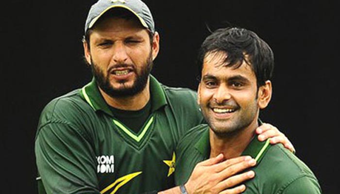 Pakistani cricketers Shahid Afridi and Mohammad Hafeez. — AFP/File