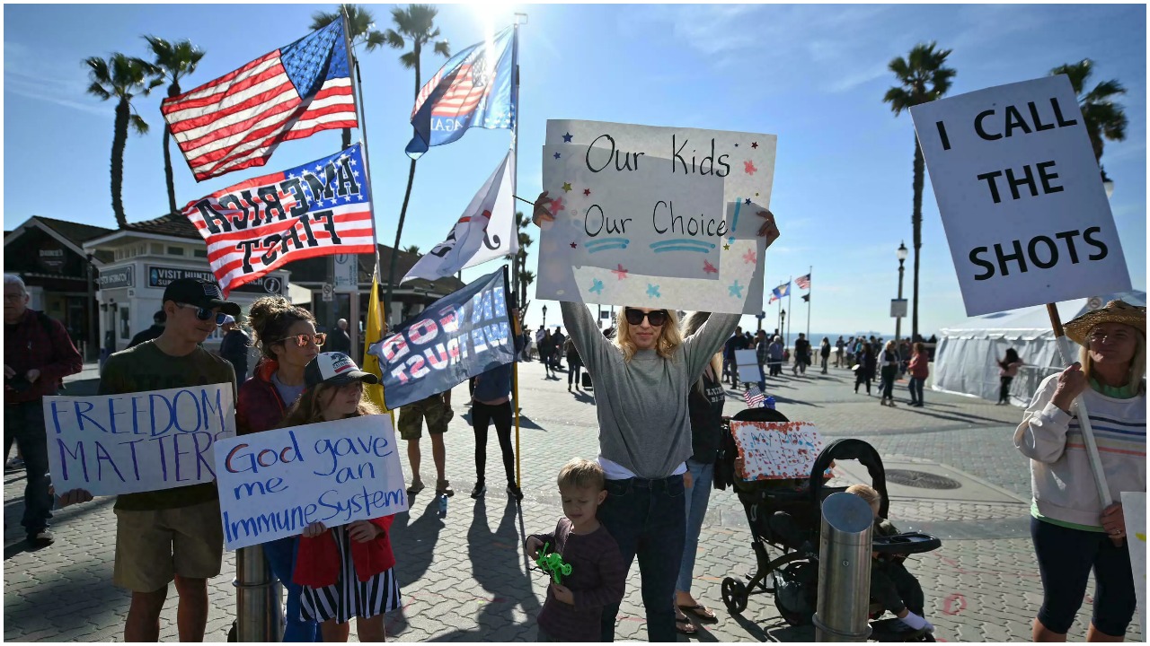 Anti-vaccine protesters in the United States, which announced well over a million new Covid cases.— AFP