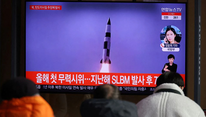 People watch a TV broadcasting file footage of a news report on North Korea firing a ballistic missile off its east coast, in Seoul, South Korea, January 5, 2022. — Reuters