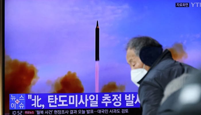 People watch a TV broadcasting file footage of a news report on North Korea firing a ballistic missile off its east coast, in Seoul, South Korea, January 5, 2022. — Reuters